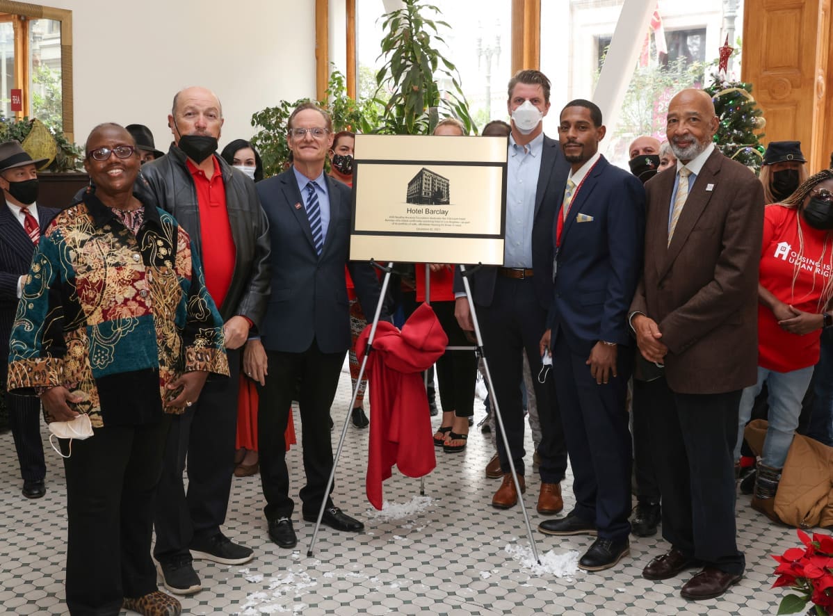 Michael Weinstein with Housing is human right team during hotel opening